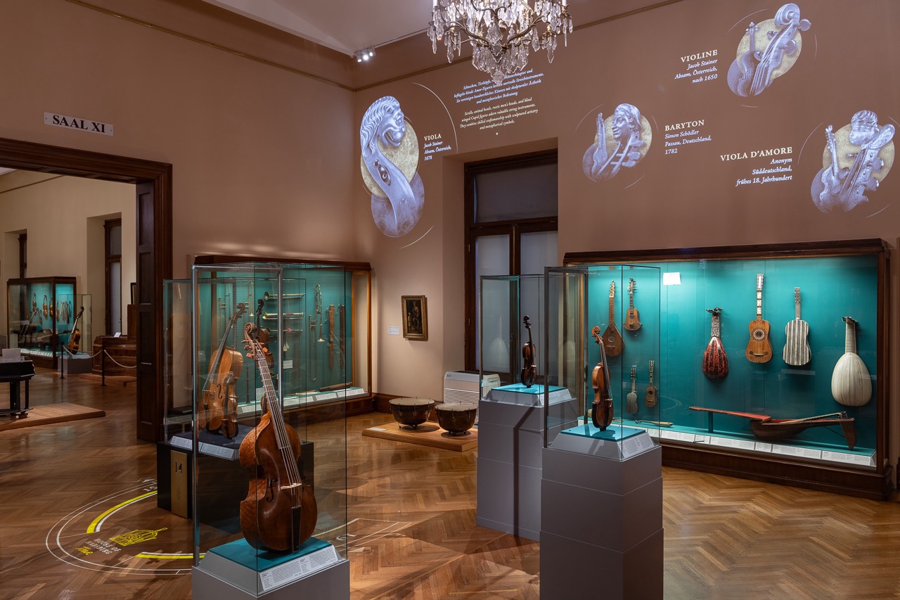 Musical instrument exhibit in Weltmuseum Wien showcasing various historical instruments